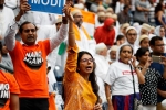 Indian Americans, narendra modi speech at howdy modi, in pictures narendra modi indian americans at howdy modi, Mother india