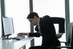 proper sitting posture at computer, sitting at computer with head forward, bad posture during computer use leads to back pain, Eyeglasses proper sitting posture at computer, sitting at computer with head forward, bad posture during computer use leads to back pain, Eyeglasses