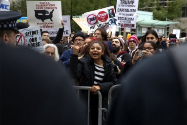 Chicago Citizens Stand United Against Trump Following His First Visit